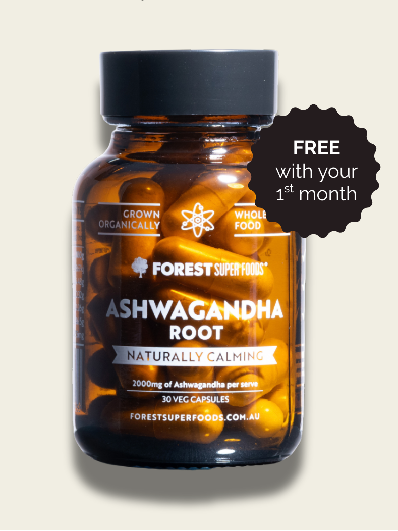 Brown glass jar filled with ashwagandha root capsules labeled Forest Super Foods on light background